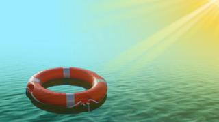 A life ring on water with strong sunshine.