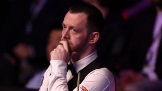 Mark Allen reacts to his missed black in the semi-final of the World Championship
