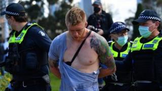 Man with ripped shirt is arrested in Melbourne