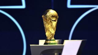 The World Cup trophy on a stand