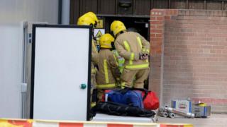 'Trapped by cheese' worker freed after warehouse collapse - BBC News