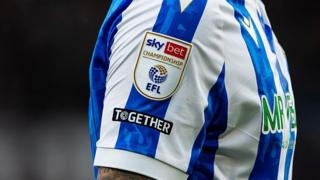 The EFL logo during on a Sheffield Wednesday shirt the Championship match against Derby County