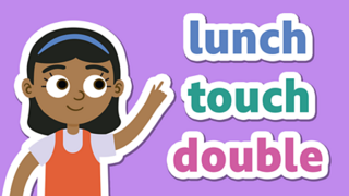 A girl pointing at words containing the letters "ou".