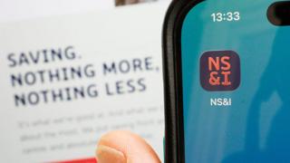 Close up of a phone with the NS&I app