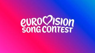 A white logo on a pink and purple background. The white logo reads, 'Eurovision song contest'.