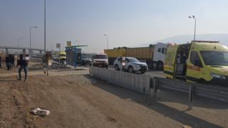 An ambulance and other vehicles at the scene of an attack in Israel (26/12/25)