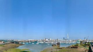 A view from Gosport to Portsmouth with blue skies overhead. Picture by BBC Weather Watcher 'Hugely Spots'
