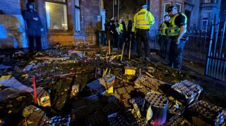 A house with firework launchers outsider and police in attendance