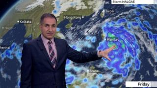 Stav Danaos in front of a weather map