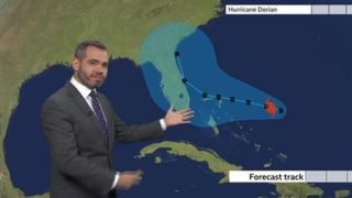 Ben Rich shows the hurricane's forecast track