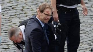 Conservative MP Tobias Ellwood helping emergency services