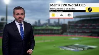 Ben Rich stands in front of a shot of Sydney Cricket Ground