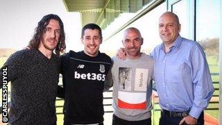 Carlos Puyol (left) with Bojan Krkic