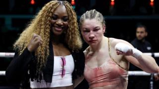 Claressa Shields and Lauren Price pose for photos after her win over Stephanie Pineiro