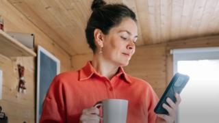 A woman using her smartphone