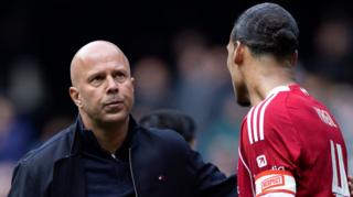 Liverpool manager Arne Slot with captain Virgil van Dijk