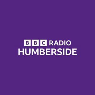 A purple and white graphic with the words BBC Radio Humberside