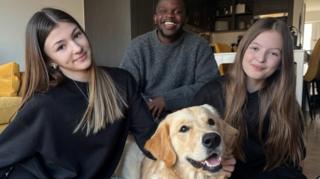 De-Graft meets Mhairi, Kirsty and Jax, the guide dog