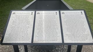 A memorial with over 70 names of deceased miners