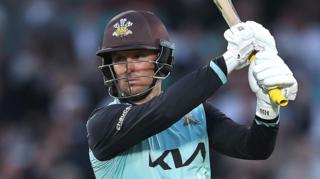 Jason Roy swishes his bat next to his left shoulder