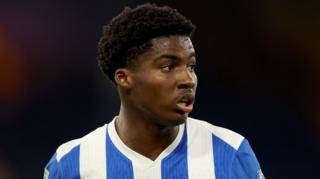 Zane Albarus, wearing Brighton's blue and white-striped home shirt in an EFL Trophy game against Luton in October 2025