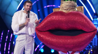 joel and a lips costume