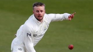 Mason Crane bowling