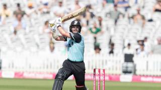 Sam Curran drives on the off side in Surrey's six wicket win over Middlesex 