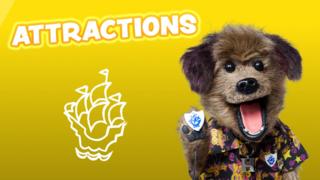 Hacker T Dog holds up his Blue Peter badge, the word Attractions is in bold. Find out which UK attractions you can visit for free with your Blue Peter badge.
