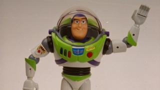 Figurine of Buzz Lightyear from Toy Story saluting