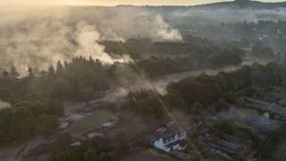 An aerial view shows burnt houses in Stourbridge