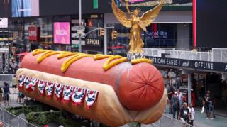 Giant hot dog sculpture in Times Square.