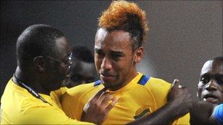 Pierre-Emerick Aubameyang is disconsolate after his penalty shoot-out miss