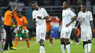 Ghanaian players react with disappointement to their semi-final defeat to Zambia