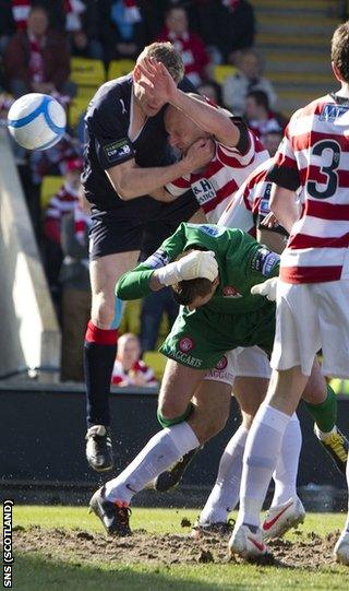 Dods heads the only goal of the game at Livingston's Almondvale Stadium