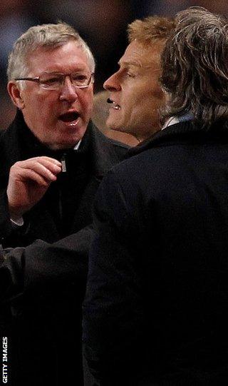 Sir Alex and Manchester City's Roberto Mancini argue on the touchline