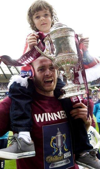 Beattie celebrates the Scottish Cup victory with his won at Hampden