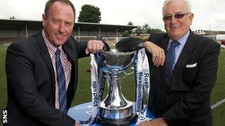 Sinclair and East Fife chairman Sid Columbine with the League Cup trophy