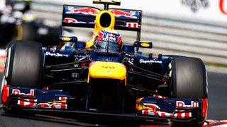 Mark Webber races for Red Bull