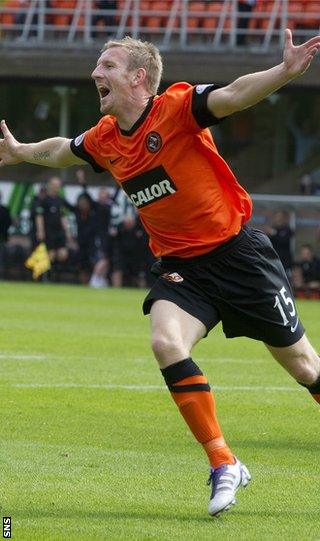 Gardyne, who arrived from Ross County, celebrates after scoring on his debut