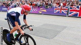 Bradley Wiggins wins the Olympic road race on home soil