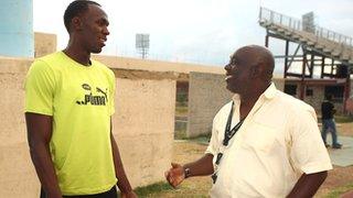 Usain Bolt with coach Glen Mills