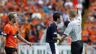 Murray shows O'Donnell the red card after sending off Russell