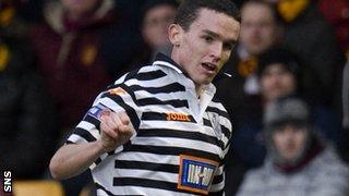 McGinn in action for Queen's Park against Motherwell last season