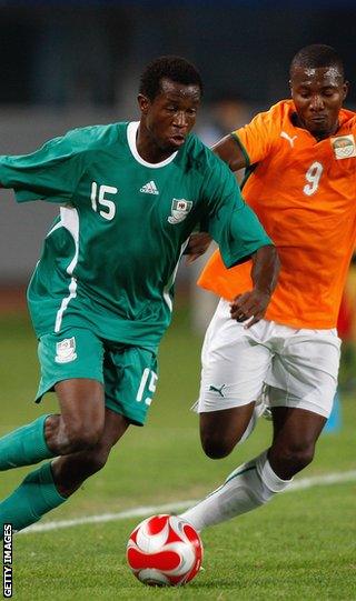 Ambrose (left) in action for Nigeria