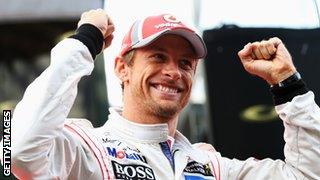 Jenson Button celebrates winning the Belgian Grand Prix