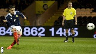 Tony Watt scores a penalty for Scotland Under-21s against Luxembourg