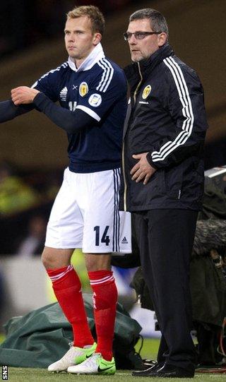 Rhodes comes on as a substitute during the second half at Hampden