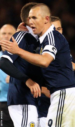 Miller celebrates after scoring for Scotland against Macedonia