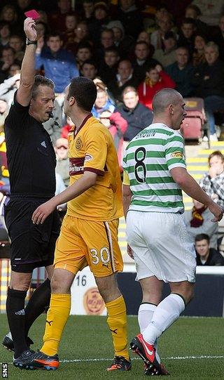 Adam Cummins is sent off by referee Iain Brines